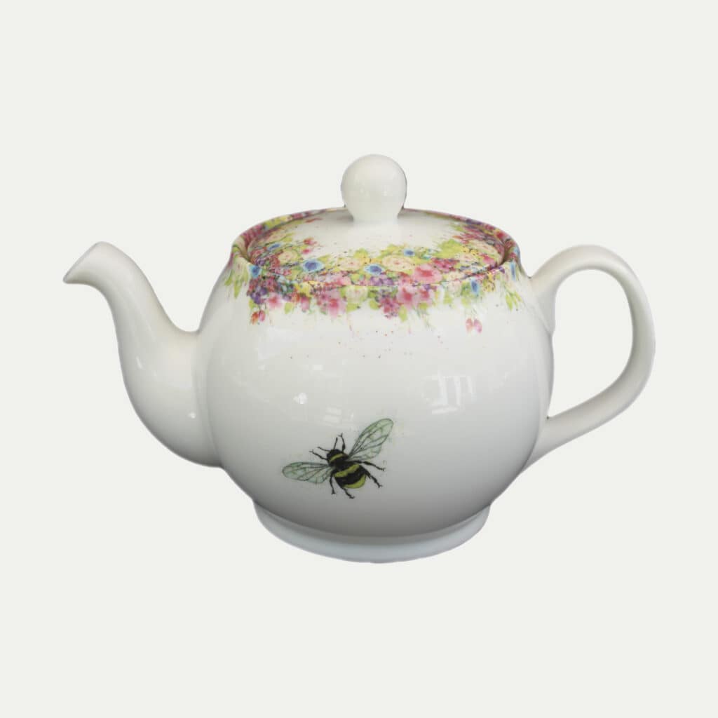 Floral decorated white china 6 cup teapot with bee design
